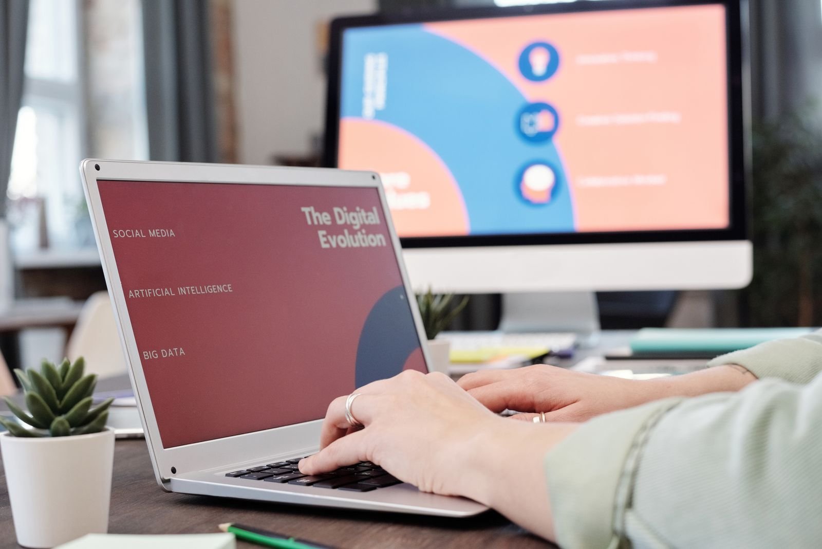 Professional using AI tools on a laptop at work