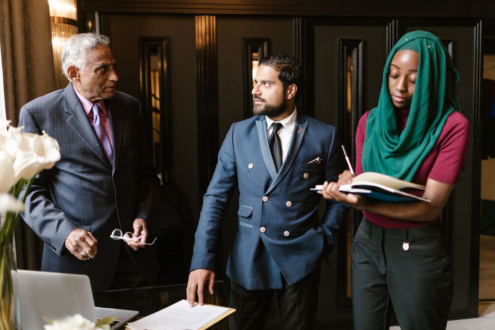 Team reviewing workplace compliance policies in a meeting