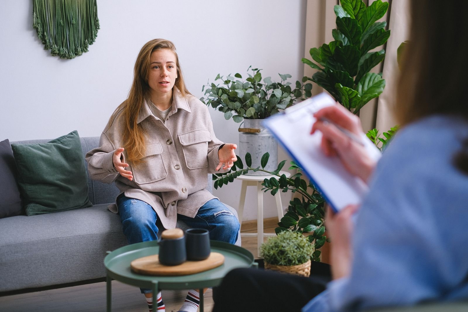 Woman talking with a counselor in a calm office