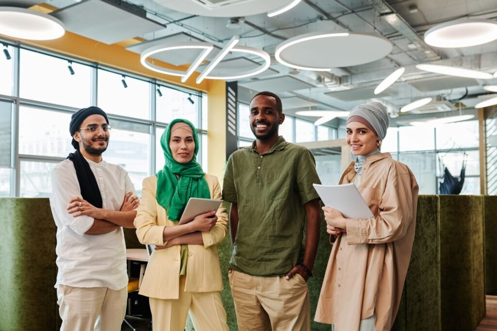 Group of diverse employees standing together in an office